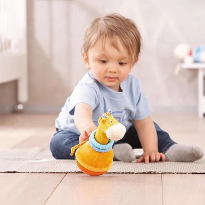 HABA Roly Poly Giraffe Soft Wobbling & Chiming Baby Toy With Teething Rings 3 HABA Roly Poly Giraffe Soft Wobbling & Chiming Baby Toy With Teething Rings